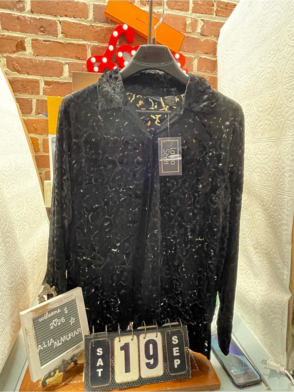 Laura Scott featuring an intricate velvet burnout pattern.